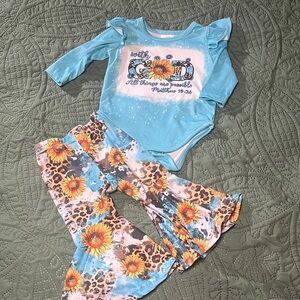 Blue Ruffle Onesie and Floral Bell Bottom Set